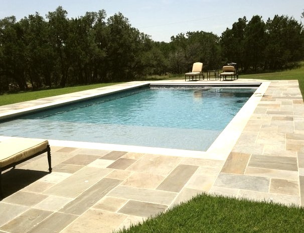 Hot tub - mid-sized modern backyard stone and rectangular lap hot tub idea